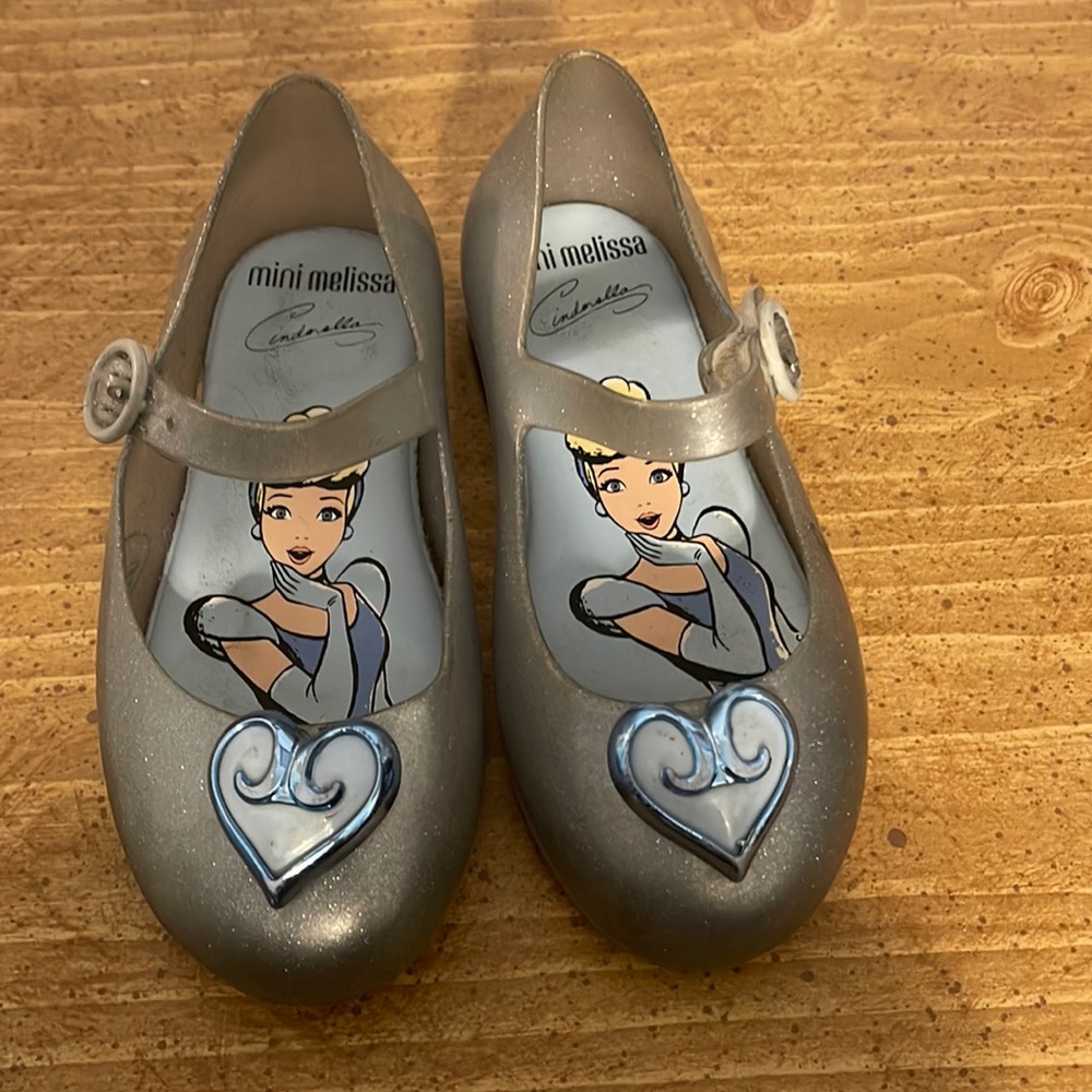 Silver Mini Melissa dress shoes in size 10.